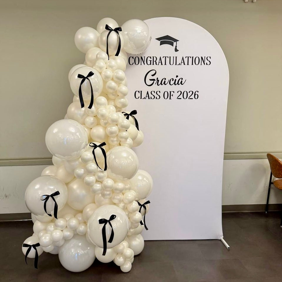 Monochrome Ribbon Arch & Organic Backdrop | Calgary Graduation Decor