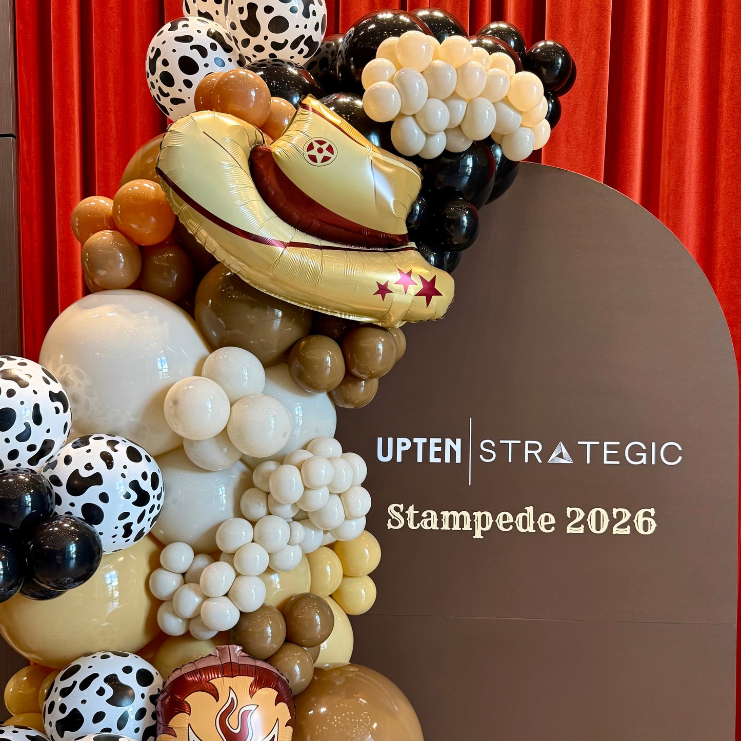 Custom Painted Wooden Arch & Western Balloon Garland | Calgary Stampede Corporate Decor