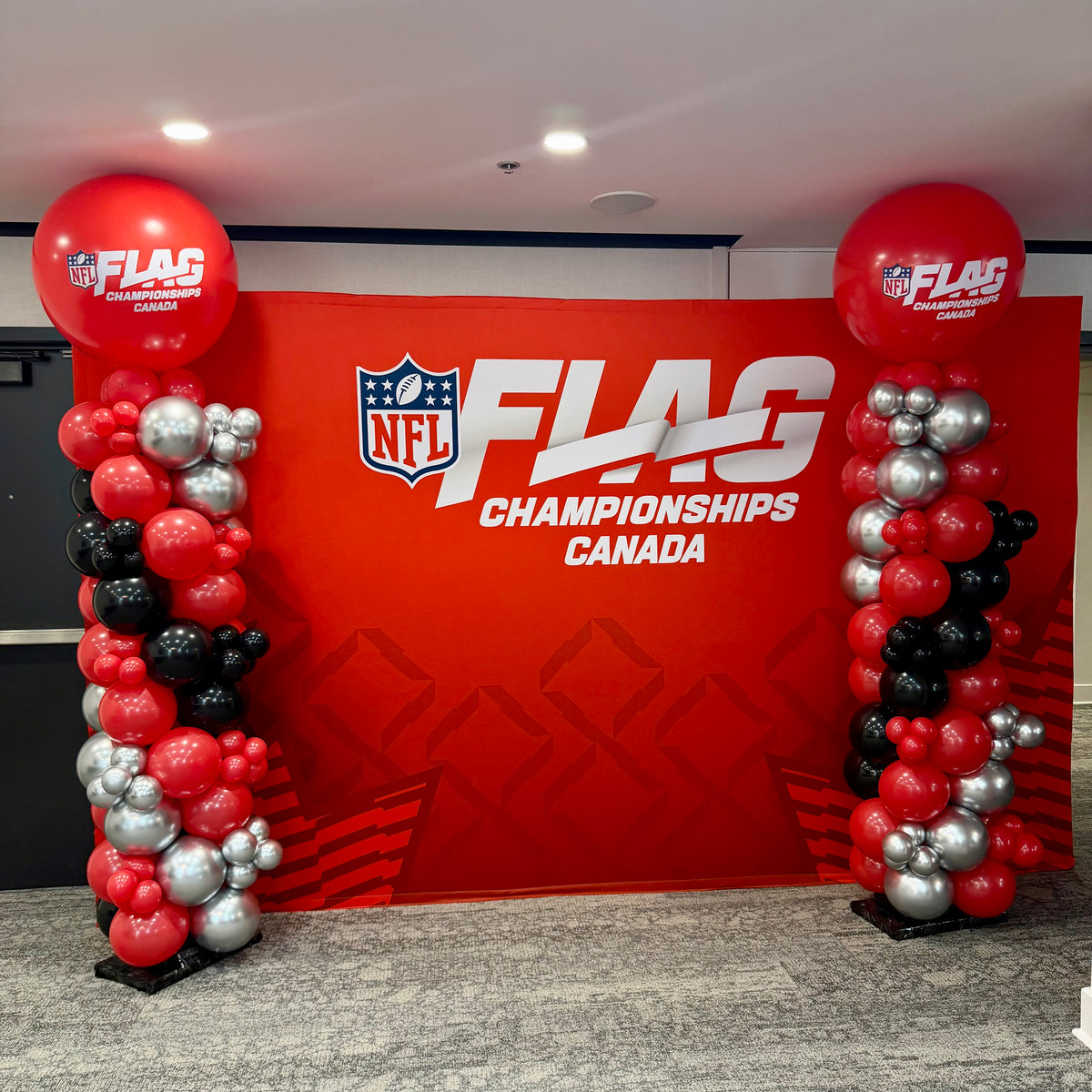 Textured Spiral Balloon Column with Corporate Logo | Calgary Retail Decor
