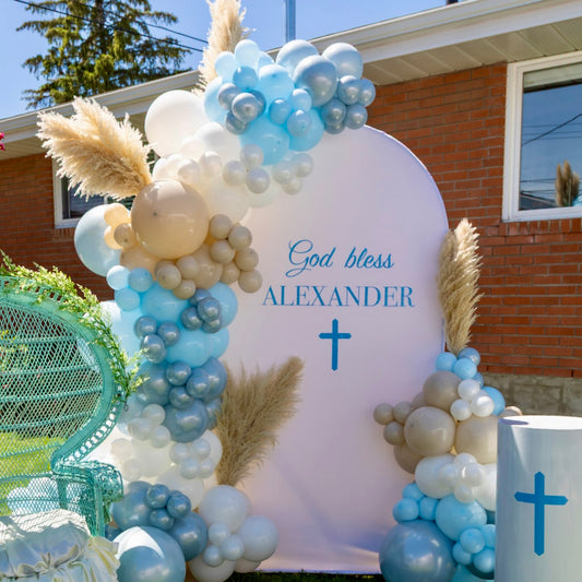 Outdoor baby blue and sand balloon arch with pampas grass for baptism photo zone Calgary