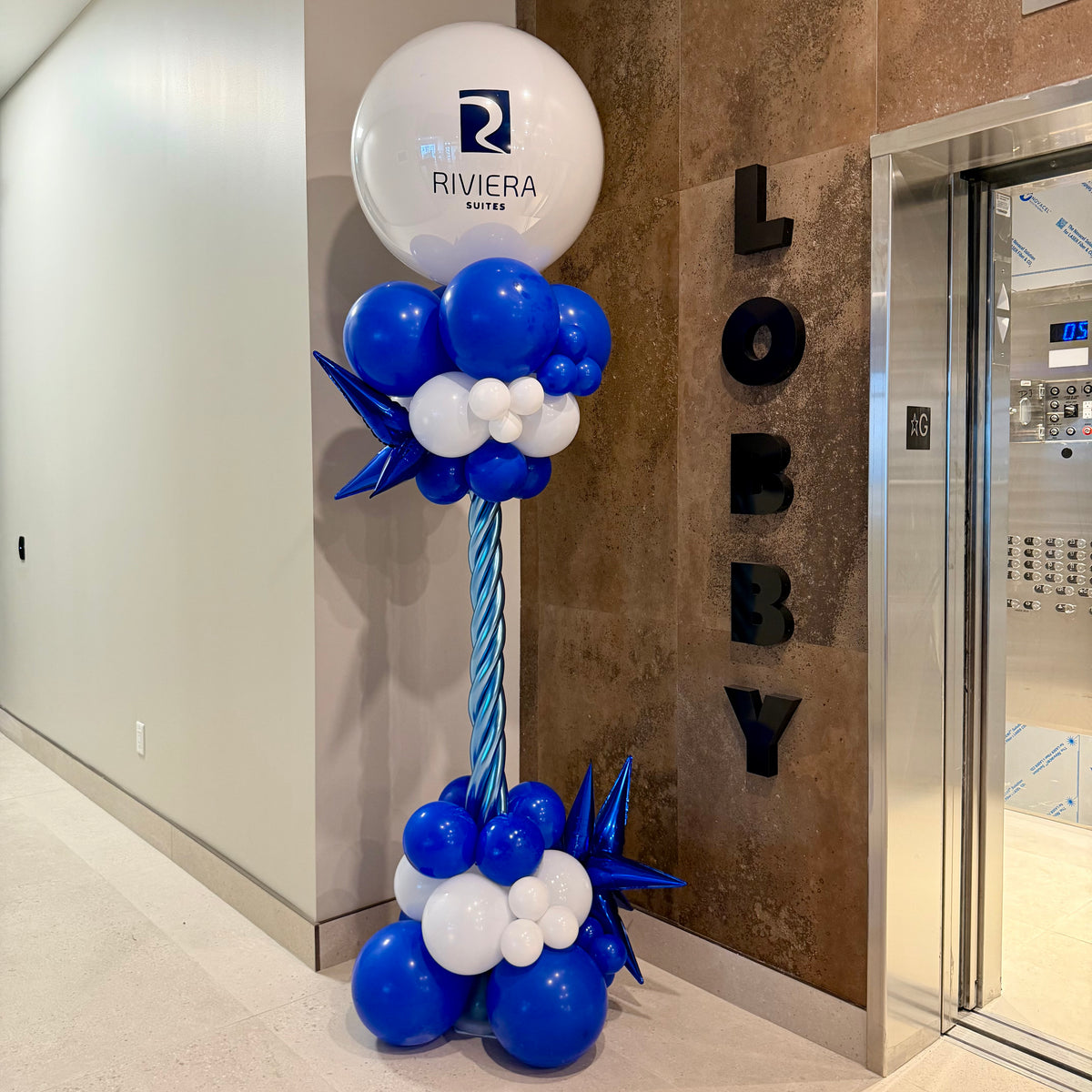 Sculpted Stem Corporate Balloon Pillar with Custom Logo | Calgary Event Decor