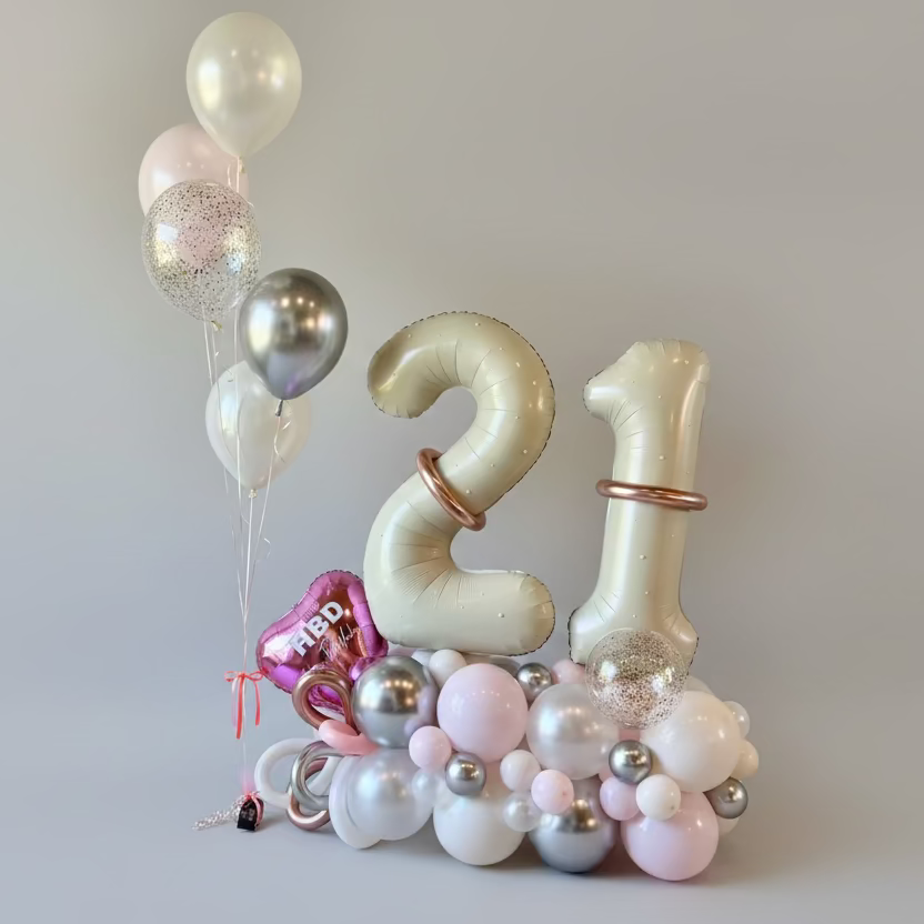 Elegant 21st birthday balloon marquee in pastel pink and chrome silver with helium bouquet Calgary event decor