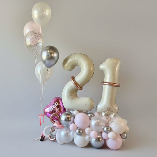 Elegant 21st birthday balloon marquee in pastel pink and chrome silver with helium bouquet Calgary event decor