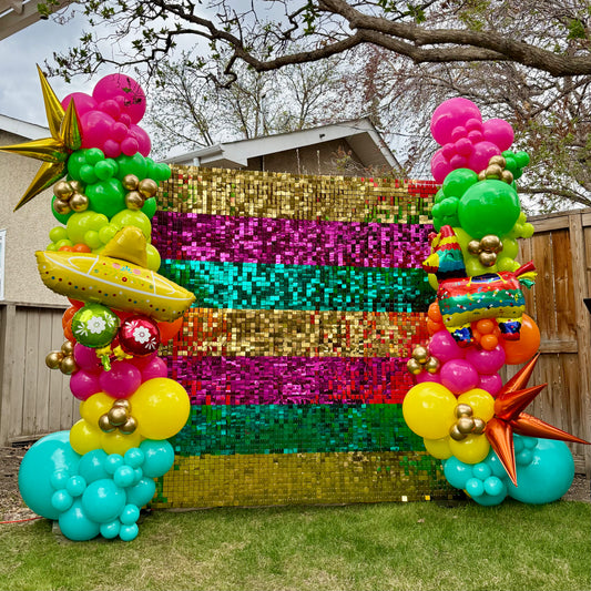 Vibrant Fiesta Shimmer Wall Photo Zone & Custom Balloon Arch