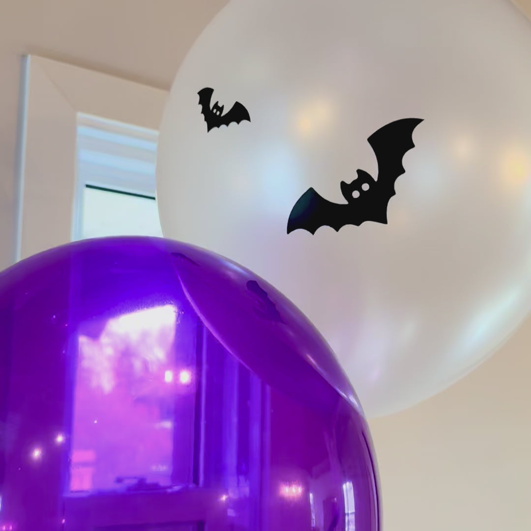 Helium balloons Wednesday theme