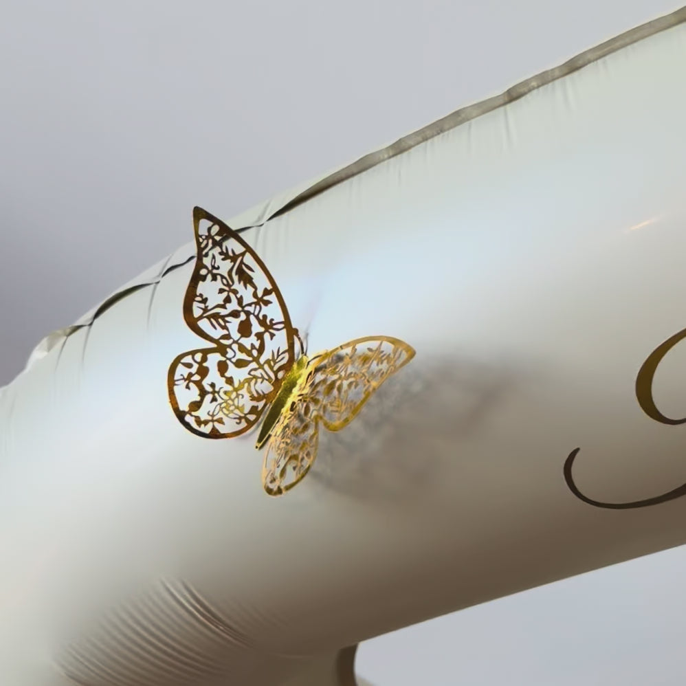 video view of luxury 40th birthday champagne cascade balloon centerpiece Calgary